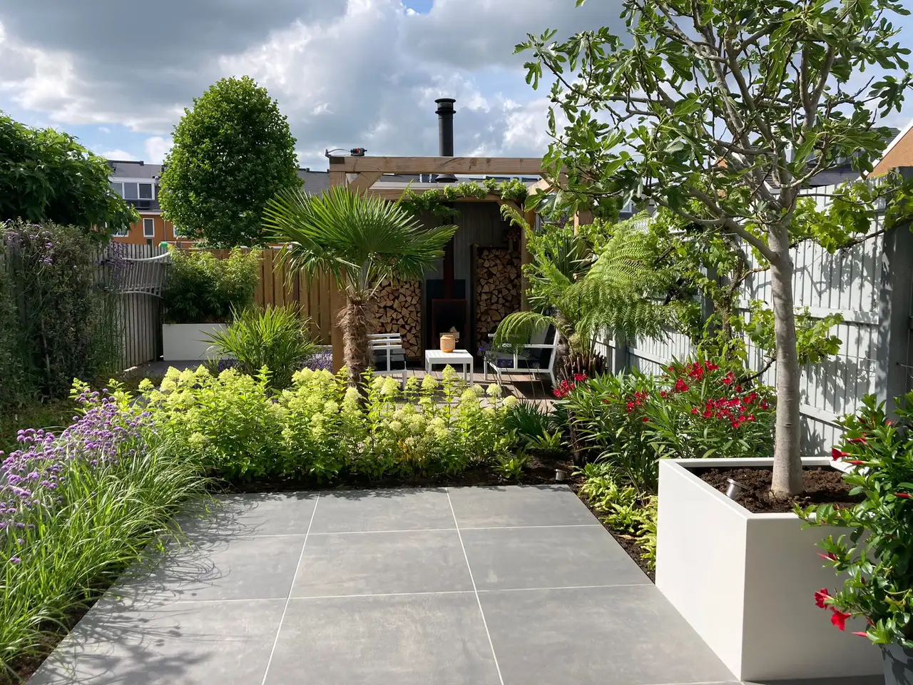 Schutting, haag of muur: welke erfafscheiding past bij uw tuin?